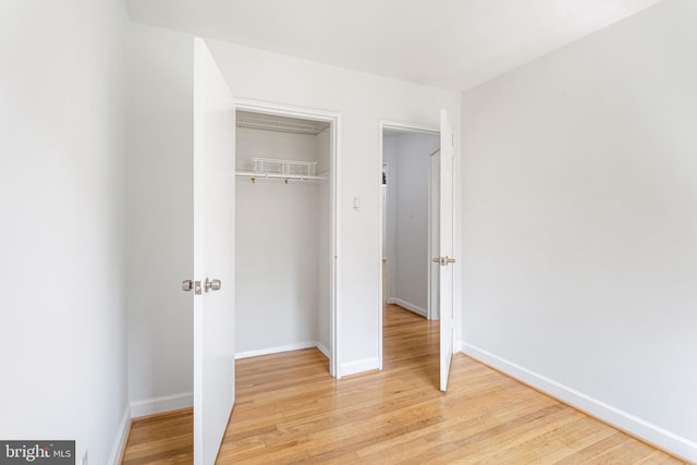 3603 Astoria Rd, Kensington, MD 20895 - unfurnished bedroom featuring a closet and light wood-style floors