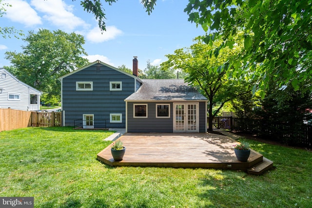 3603 Astoria Rd, Kensington, MD 20895 - back of house featuring french doors, a fenced backyard, a deck, a chimney, and roof with shingles