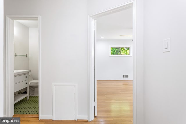 3603 Astoria Rd, Kensington, MD 20895 - corridor with light wood-style floors and baseboards