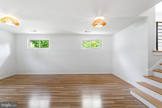 3603 Astoria Rd, Kensington, MD 20895 - spare room featuring wood finished floors and stairway