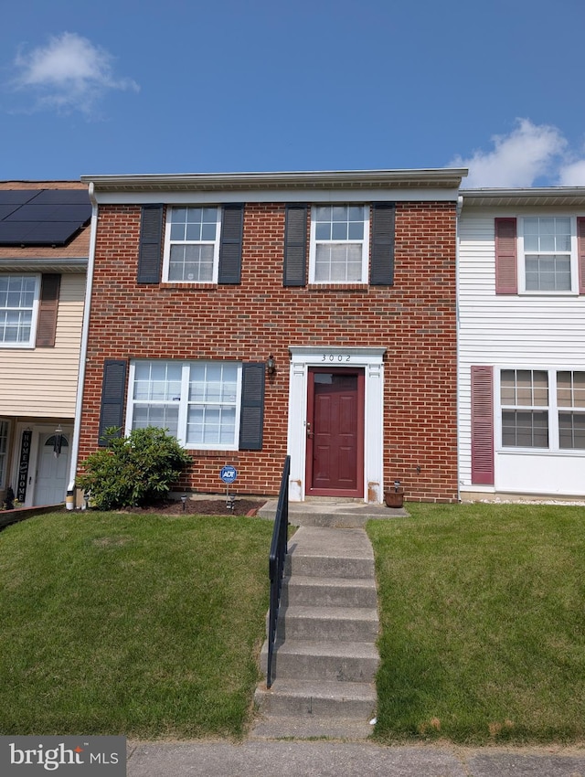 3002 Brinkley Station Dr, Temple Hills, MD 20748 - view of property with a front yard and brick siding