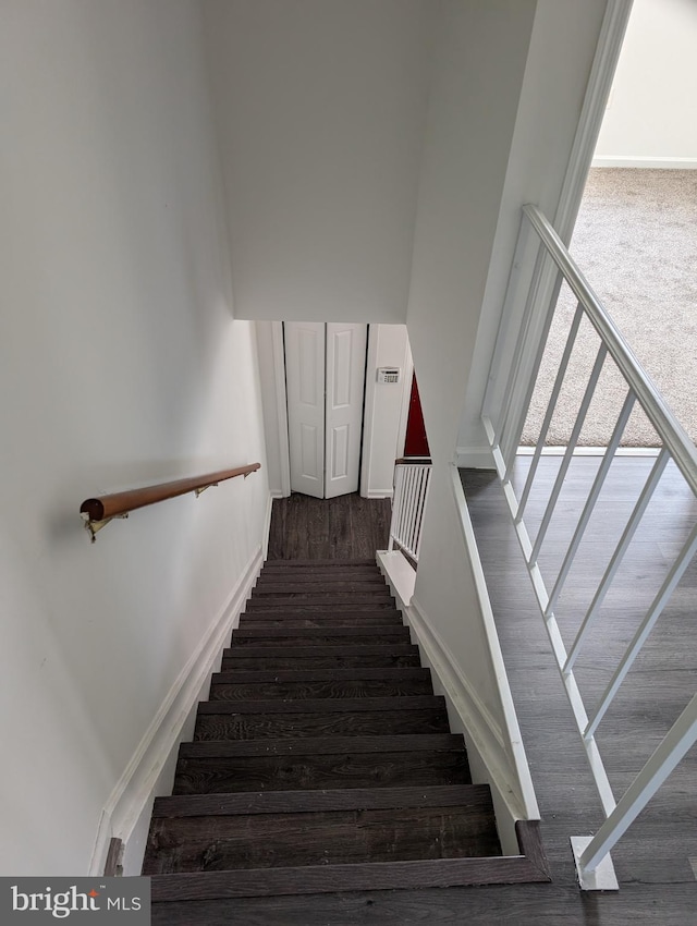3002 Brinkley Station Dr, Temple Hills, MD 20748 - stairs featuring wood finished floors and baseboards