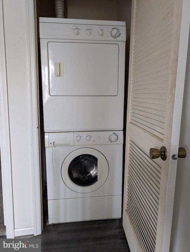 3002 Brinkley Station Dr, Temple Hills, MD 20748 - laundry room featuring estacked washer and dryer and dark wood finished floors