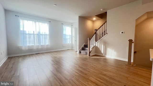4904 Brookside Ct, Coopersburg, PA 18036 - unfurnished living room with wood finished floors, stairs, and baseboards