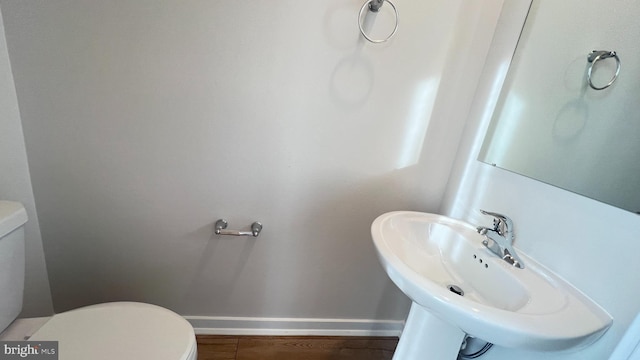 4904 Brookside Ct, Coopersburg, PA 18036 - half bath featuring toilet, a sink, and baseboards