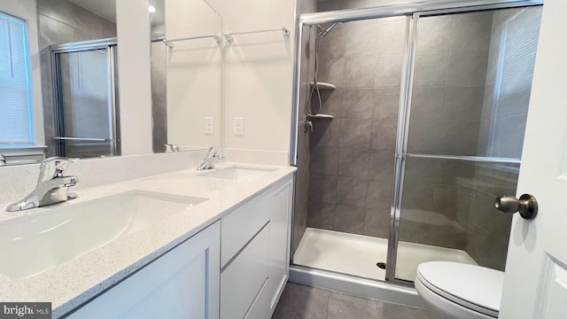4904 Brookside Ct, Coopersburg, PA 18036 - bathroom with toilet, a stall shower, double vanity, and tile patterned floors