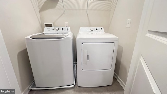 4904 Brookside Ct, Coopersburg, PA 18036 - washroom with washing machine and clothes dryer and light tile patterned floors