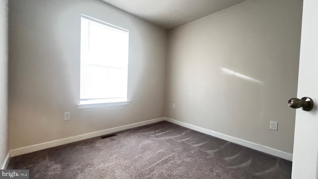 4904 Brookside Ct, Coopersburg, PA 18036 - spare room with dark carpet and baseboards