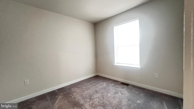 4904 Brookside Ct, Coopersburg, PA 18036 - empty room with dark colored carpet and baseboards