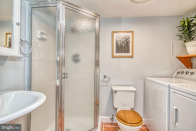 2990 S Columbus St, Arlington, VA 22206 - full bath with separate washer and dryer, a stall shower, toilet, tile patterned flooring, and a sink