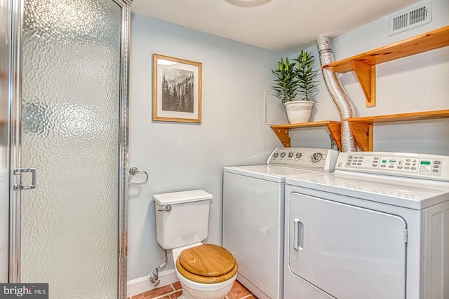 2990 S Columbus St, Arlington, VA 22206 - washroom featuring washer and dryer and baseboards