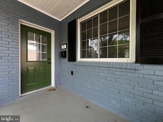 13 53rd Pl SE, Washington, DC 20019 - property entrance featuring brick siding and a porch