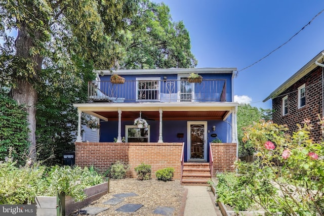805 Islington St, Silver Spring, MD 20910 - view of front of home with a balcony, covered porch, and a garden