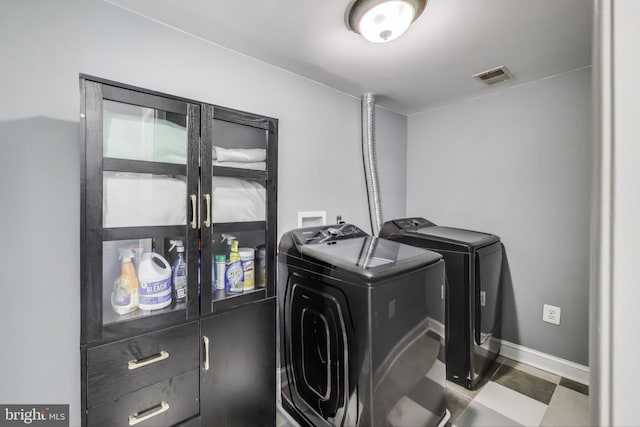805 Islington St, Silver Spring, MD 20910 - washroom with washer and dryer and baseboards
