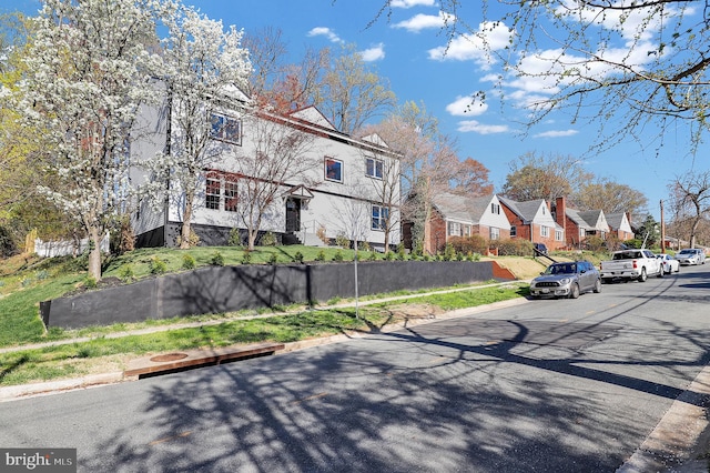 11921 Coronada Pl, Kensington, MD 20895 - view of asphalt street with sidewalks, a residential view, and curbs