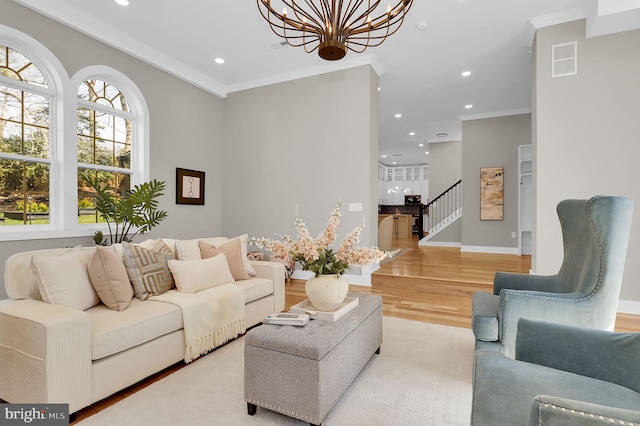 11921 Coronada Pl, Kensington, MD 20895 - living area featuring a chandelier, light wood-style floors, crown molding, stairway, and recessed lighting