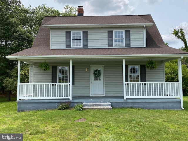 21344 Tanyard Rd, Preston, MD 21655 - farmhouse-style home featuring a porch, a chimney, a front yard, and roof with shingles