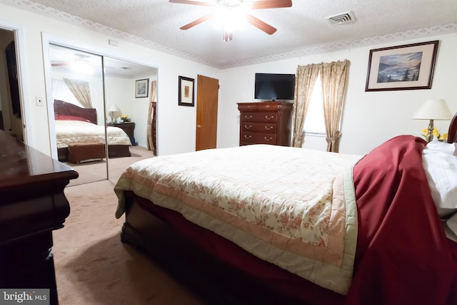 34 Georgetown Rd, Bordentown, NJ 08505 - bedroom with carpet floors, a textured ceiling, ceiling fan, and a closet