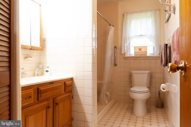 34 Georgetown Rd, Bordentown, NJ 08505 - bathroom with tile walls, vanity, a shower stall, and tile patterned floors
