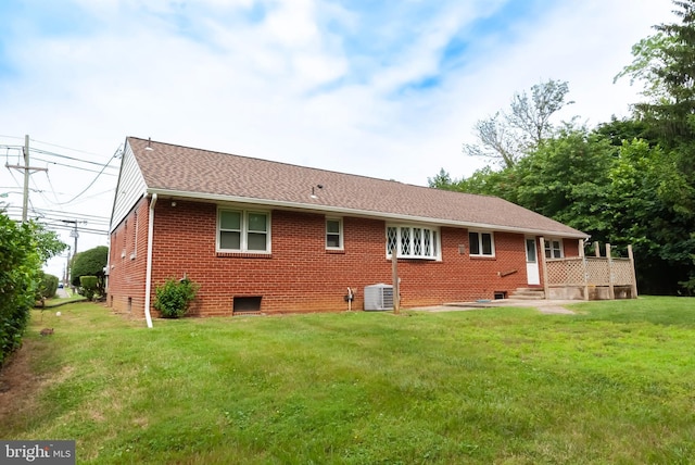 34 Georgetown Rd, Bordentown, NJ 08505 - rear view of house featuring a yard, brick siding, and roof with shingles