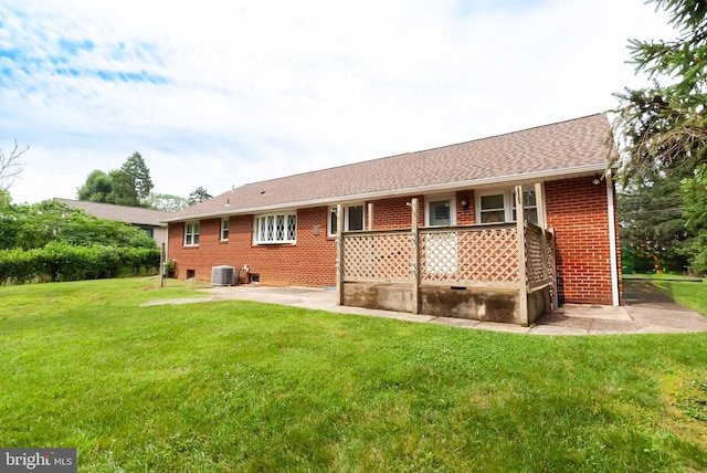 34 Georgetown Rd, Bordentown, NJ 08505 - back of property featuring a yard, brick siding, covered porch, and roof with shingles
