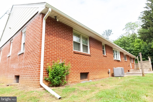 34 Georgetown Rd, Bordentown, NJ 08505 - view of property exterior featuring a lawn and brick siding