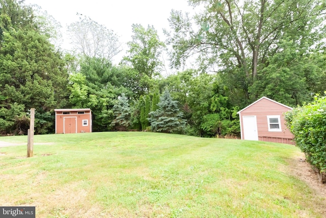 34 Georgetown Rd, Bordentown, NJ 08505 - view of green lawn with a storage unit