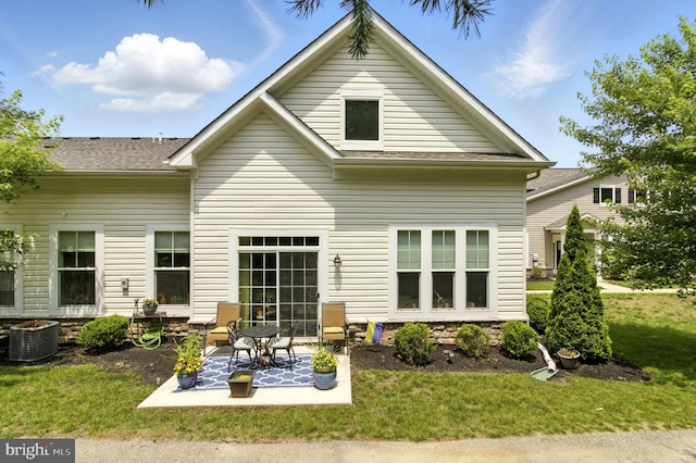 135 Jacobia Dr Unit H-3, Pasadena, MD 21122 - back of property featuring a patio, a lawn, and roof with shingles