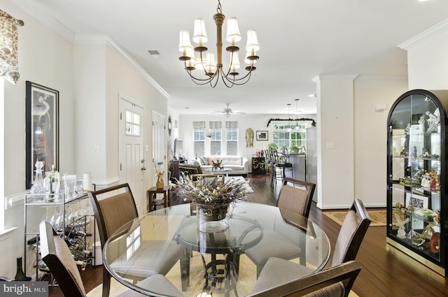 135 Jacobia Dr Unit H-3, Pasadena, MD 21122 - dining area featuring wood finished floors, a chandelier, ornamental molding, and ceiling fan