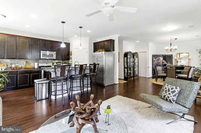 135 Jacobia Dr Unit H-3, Pasadena, MD 21122 - living area with a chandelier, ceiling fan, dark wood-style floors, recessed lighting, and crown molding