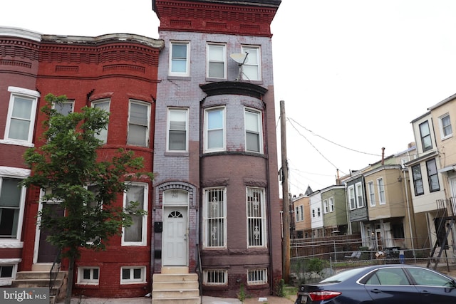 1501 Druid Hill Ave, Baltimore, MD 21217 - townhome / multi-family property with entry steps and brick siding