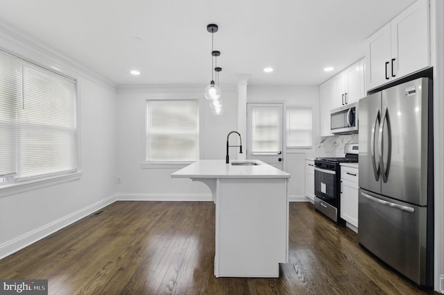 1964 Guy Way, Dundalk, MD 21222 - kitchen featuring stainless steel appliances, a sink, light countertops, white cabinetry, and ornamental molding