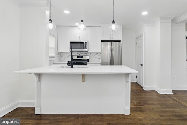 1964 Guy Way, Dundalk, MD 21222 - kitchen with stainless steel appliances, light countertops, dark wood-type flooring, a breakfast bar, and recessed lighting