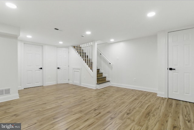 1964 Guy Way, Dundalk, MD 21222 - finished below grade area with light wood-type flooring, stairway, recessed lighting, and baseboards