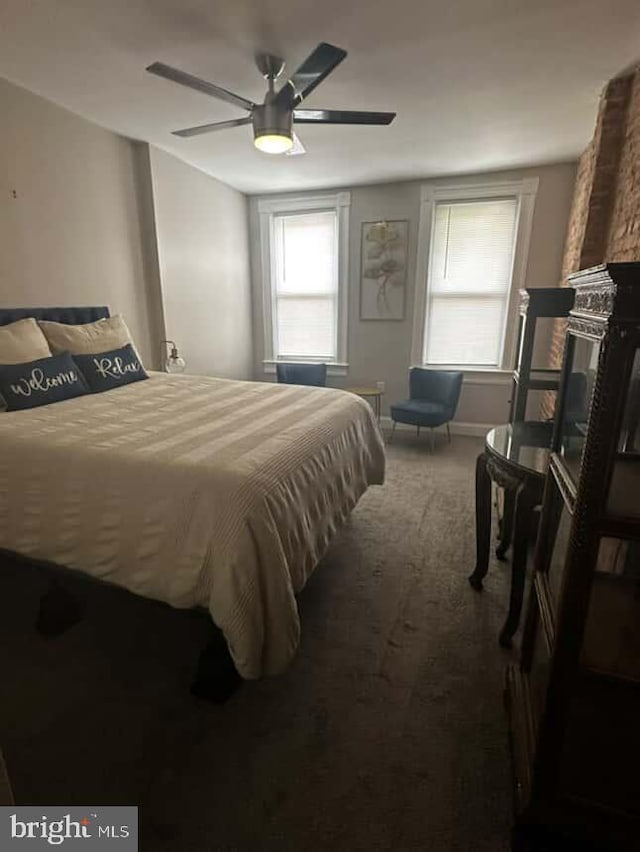 1528 N Ellamont St, Baltimore, MD 21216 - bedroom featuring carpet, multiple windows, baseboards, and a ceiling fan