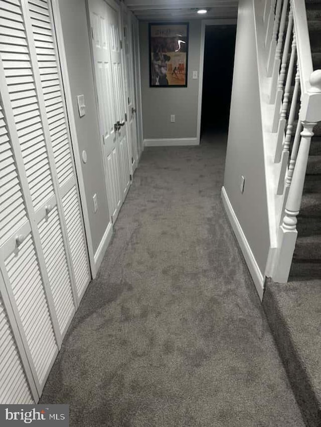 1528 N Ellamont St, Baltimore, MD 21216 - hall with carpet flooring, baseboards, and stairway