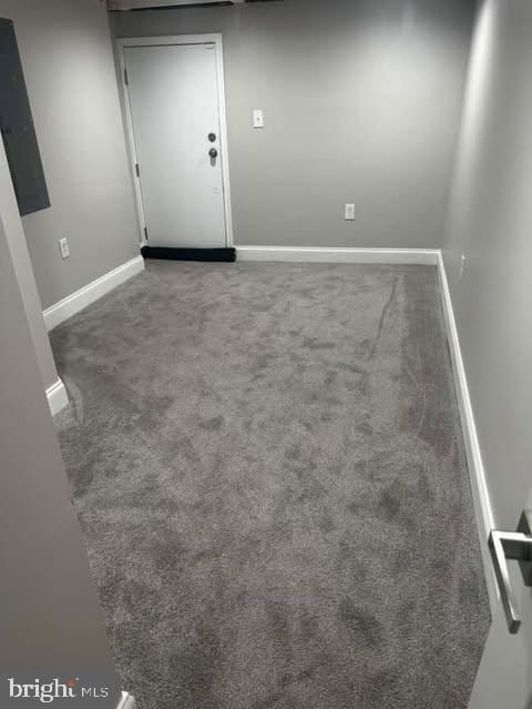 1528 N Ellamont St, Baltimore, MD 21216 - empty room featuring carpet and baseboards