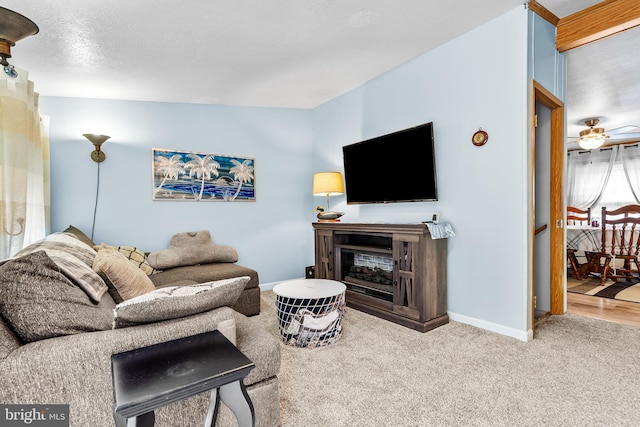 315 Robinhood Rd, Havre De Grace, MD 21078 - carpeted living room featuring baseboards and a glass covered fireplace
