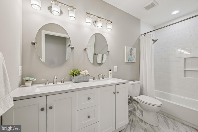518 N Patterson Park Ave, Baltimore, MD 21205 - bathroom featuring toilet, double vanity, marble finish flooring, and shower / bath combination with curtain