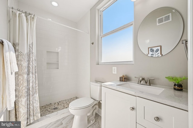 518 N Patterson Park Ave, Baltimore, MD 21205 - bathroom with vanity, toilet, a tile shower, marble finish flooring, and recessed lighting