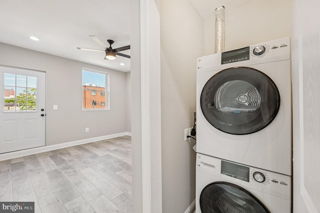 518 N Patterson Park Ave, Baltimore, MD 21205 - laundry area with stacked washer and clothes dryer, ceiling fan, light wood-style flooring, baseboards, and recessed lighting