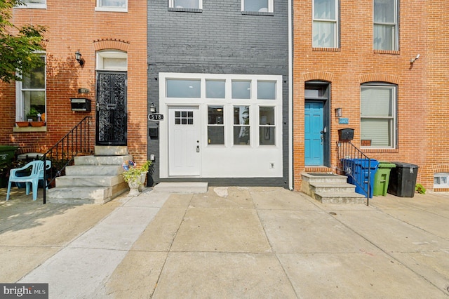 518 N Patterson Park Ave, Baltimore, MD 21205 - entrance to property with brick siding