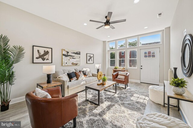 518 N Patterson Park Ave, Baltimore, MD 21205 - living area with a ceiling fan, wood finished floors, baseboards, and recessed lighting