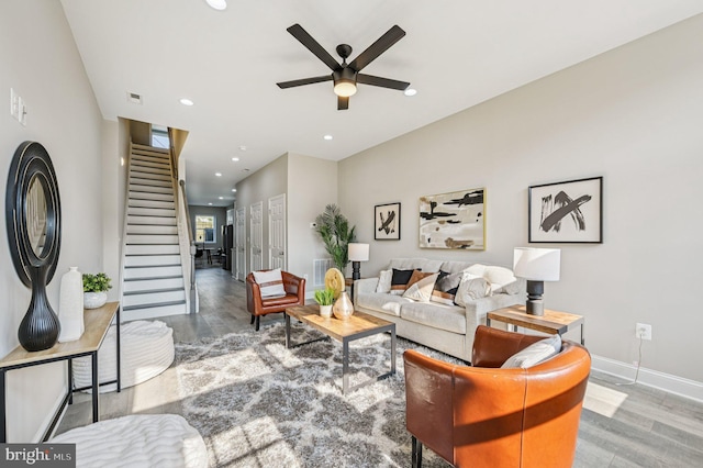 518 N Patterson Park Ave, Baltimore, MD 21205 - living room featuring wood finished floors, stairs, a ceiling fan, baseboards, and recessed lighting