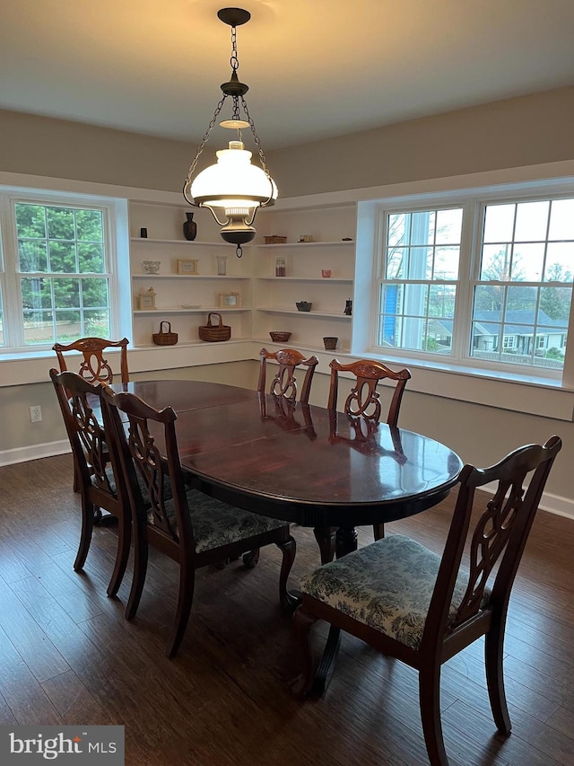 896 Hershey Heights Rd, Hanover, PA 17331 - dining area featuring dark wood-type flooring, healthy amount of natural light, and baseboards