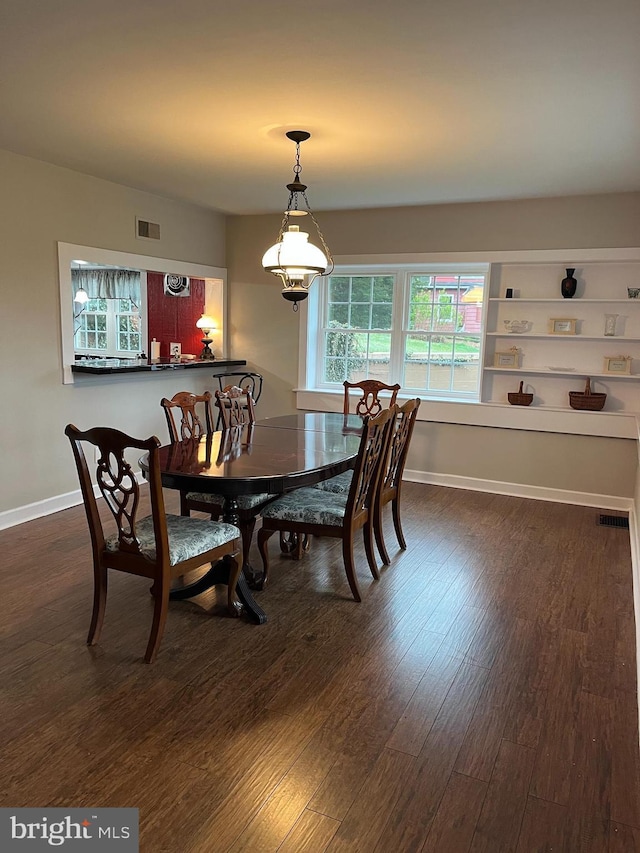 896 Hershey Heights Rd, Hanover, PA 17331 - dining room featuring dark wood-style floors and baseboards