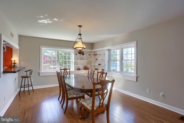 896 Hershey Heights Rd, Hanover, PA 17331 - dining space with dark wood-style floors and baseboards