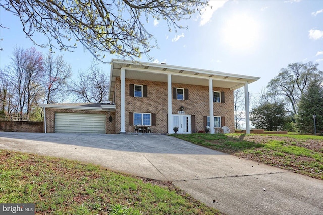 896 Hershey Heights Rd, Hanover, PA 17331 - view of home's exterior featuring concrete driveway, brick siding, and an attached garage