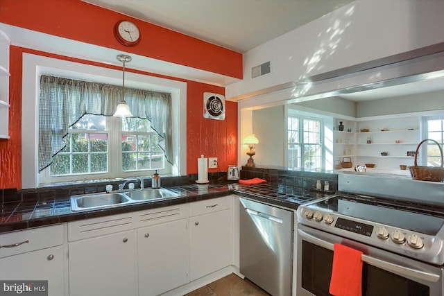 896 Hershey Heights Rd, Hanover, PA 17331 - kitchen with stainless steel appliances, a sink, plenty of natural light, and white cabinetry