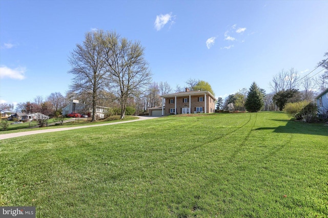 896 Hershey Heights Rd, Hanover, PA 17331 - view of grassy yard featuring a garage and driveway